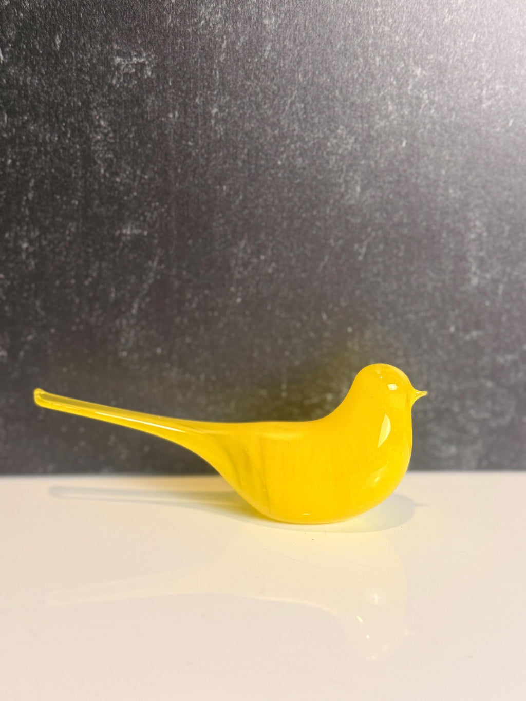 Yellow glass bird