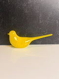 Yellow glass bird